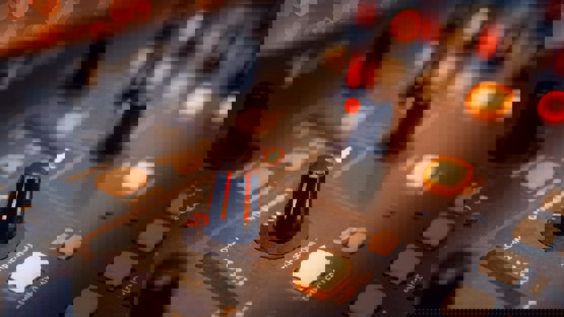 Close up of buttons on a control desk