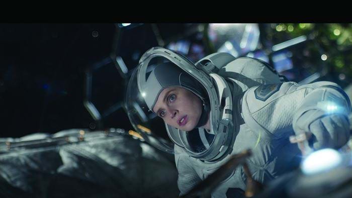 Image of actor Felicity Jones exploring space in Netflix production the Midnight Sky