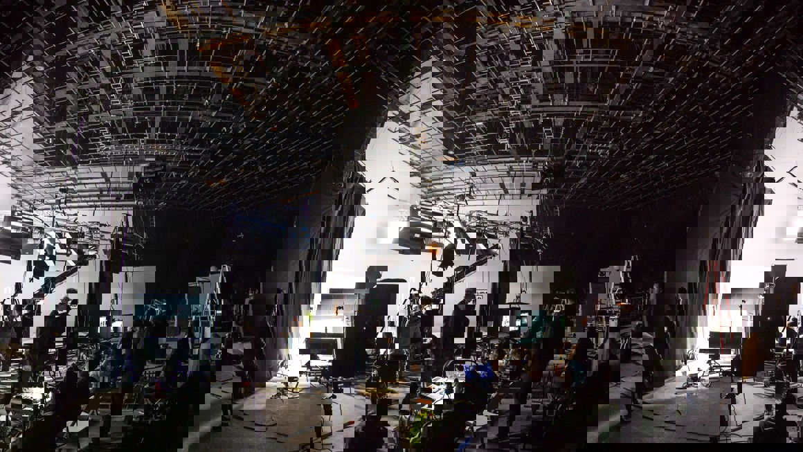 Wide shot of an active film set