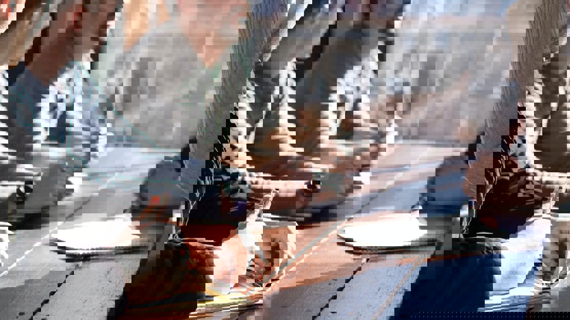 group of workers sitting around a table