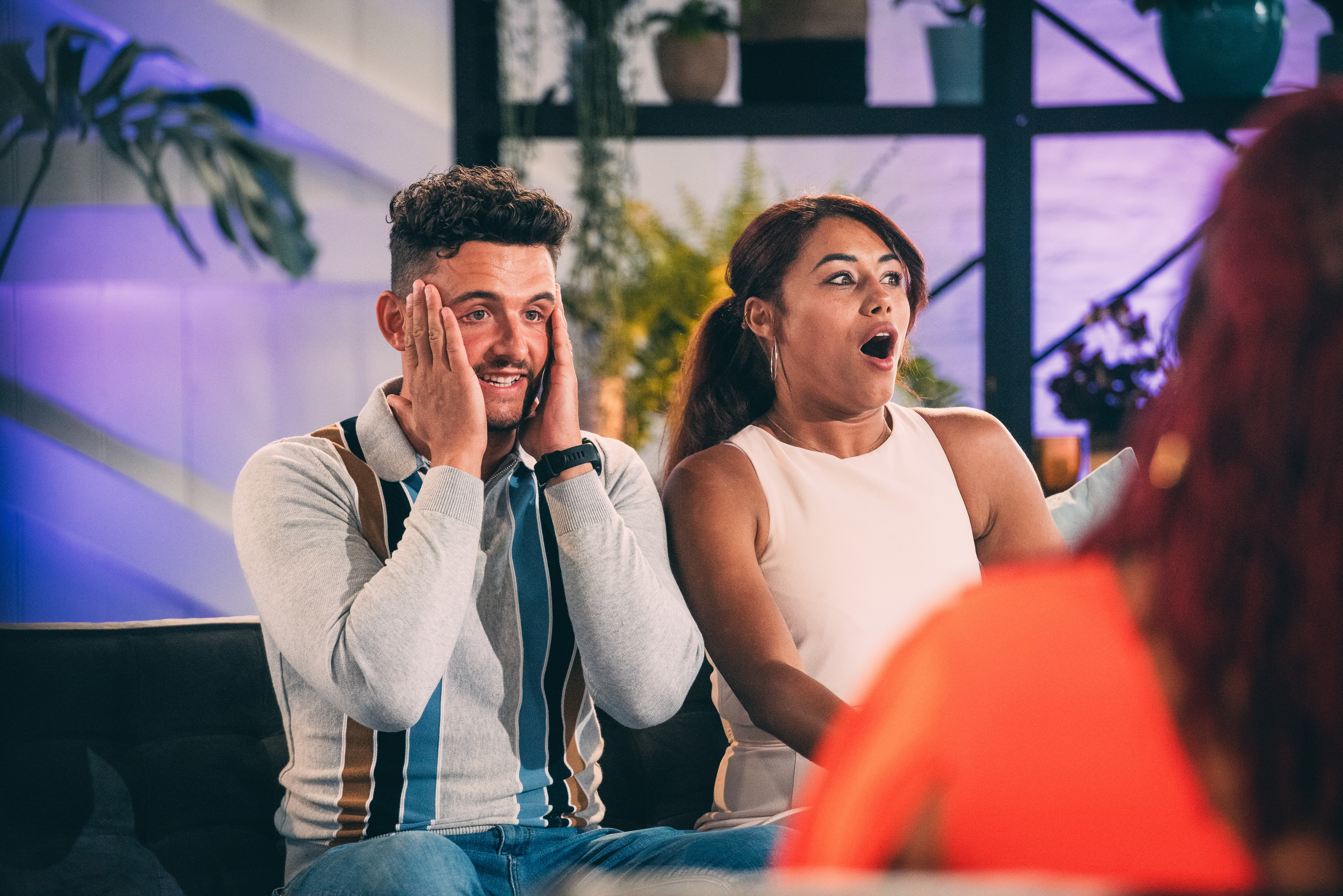 A guy and a girl look very surprised, a still from Married at First Sight