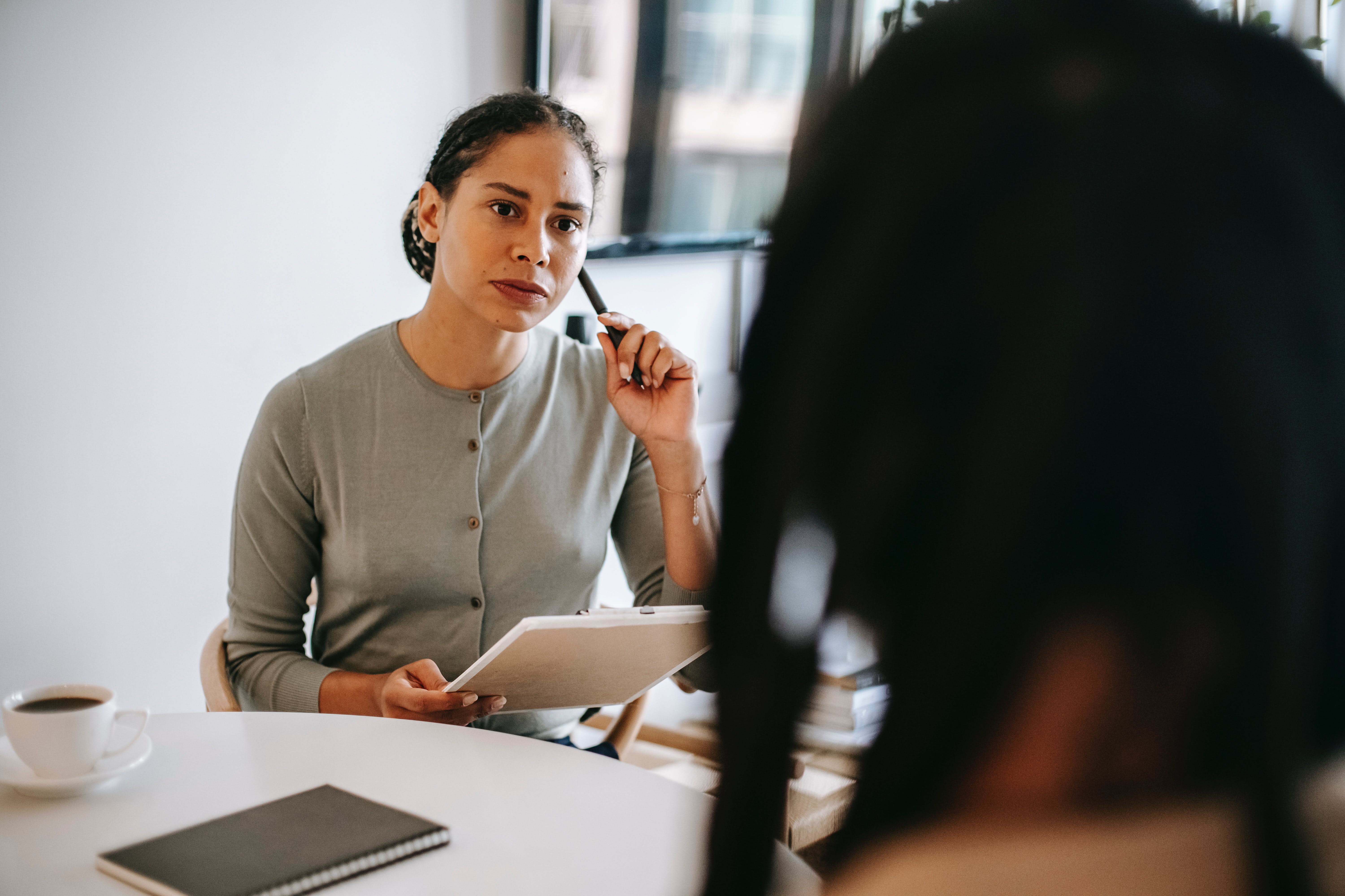 woman listening attentively to a colleague