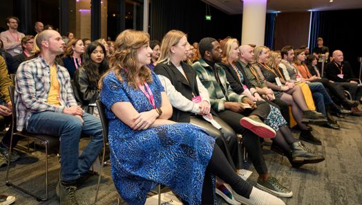 The Leaders of Tomorrow and guests watching the speeches