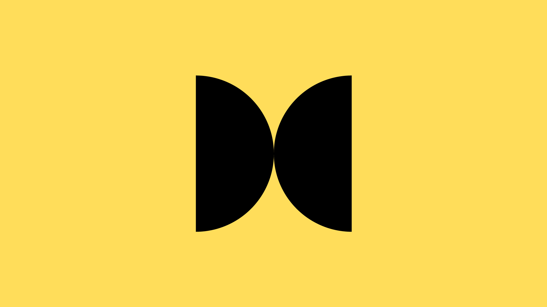 A black abstract graphic shape against a yellow background