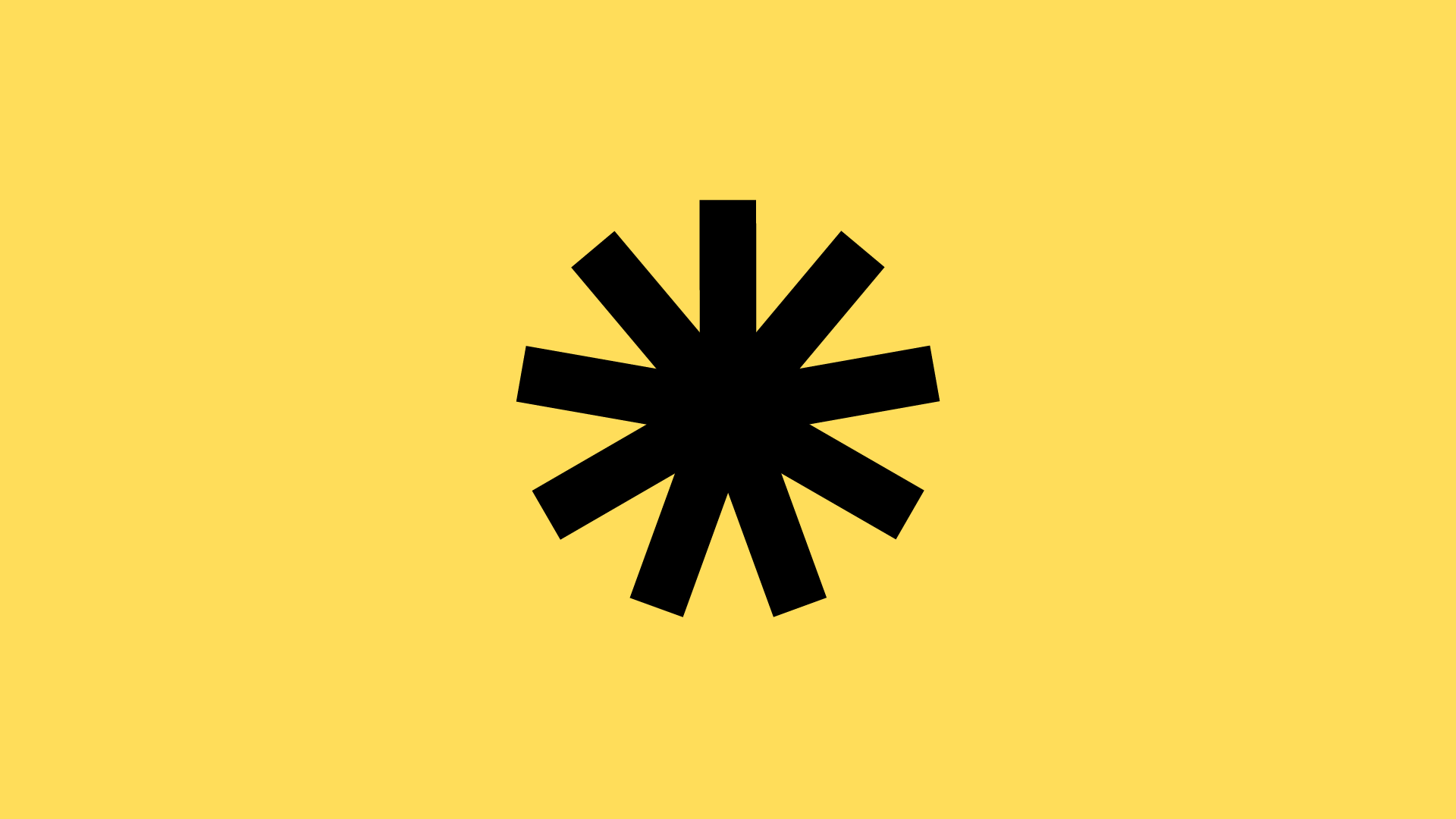 A black abstract graphic shape against a yellow background